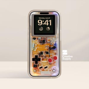 May include: Transparent phone case with a retro video game design. The case has a black cross-shaped directional pad, red buttons, and a circuit board pattern. The phone screen shows the time: 9:41.