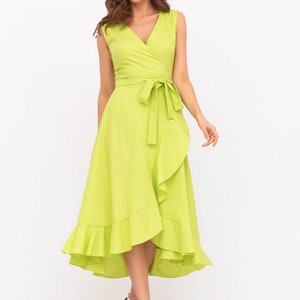 May include: A lime green wrap dress with a ruffled hem and a tie at the waist.
