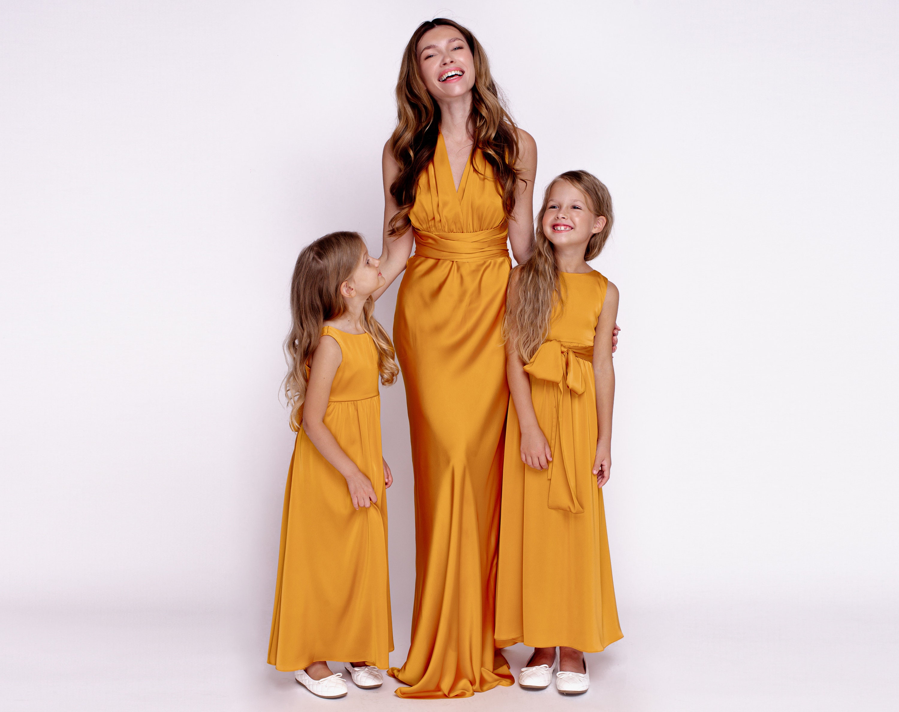 mommy and me gold dresses Yellow dresses with golden lace 