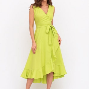 May include: A lime green wrap dress with a ruffled hem and a tie at the waist.