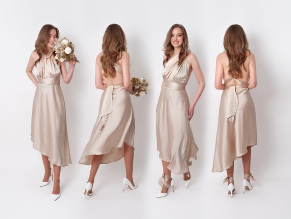 infinity dress beige Beige Infinity Dress! This soft, warm tone is a popular choice for  bridesmaid dresses as it offers a classic and elegant look. #beige  #beigetheme #weddingtheme #champagnewedding #nudethemewedding #gownrental  #entouragedresses #bridesmaiddresses