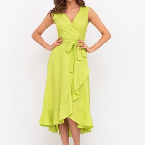 May include: A lime green wrap dress with a ruffled hem and a tie at the waist.