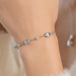 Blue Topaz Tennis Bracelet: Oval Cut Sterling Silver, Gold Vermeil November & December Birthstone