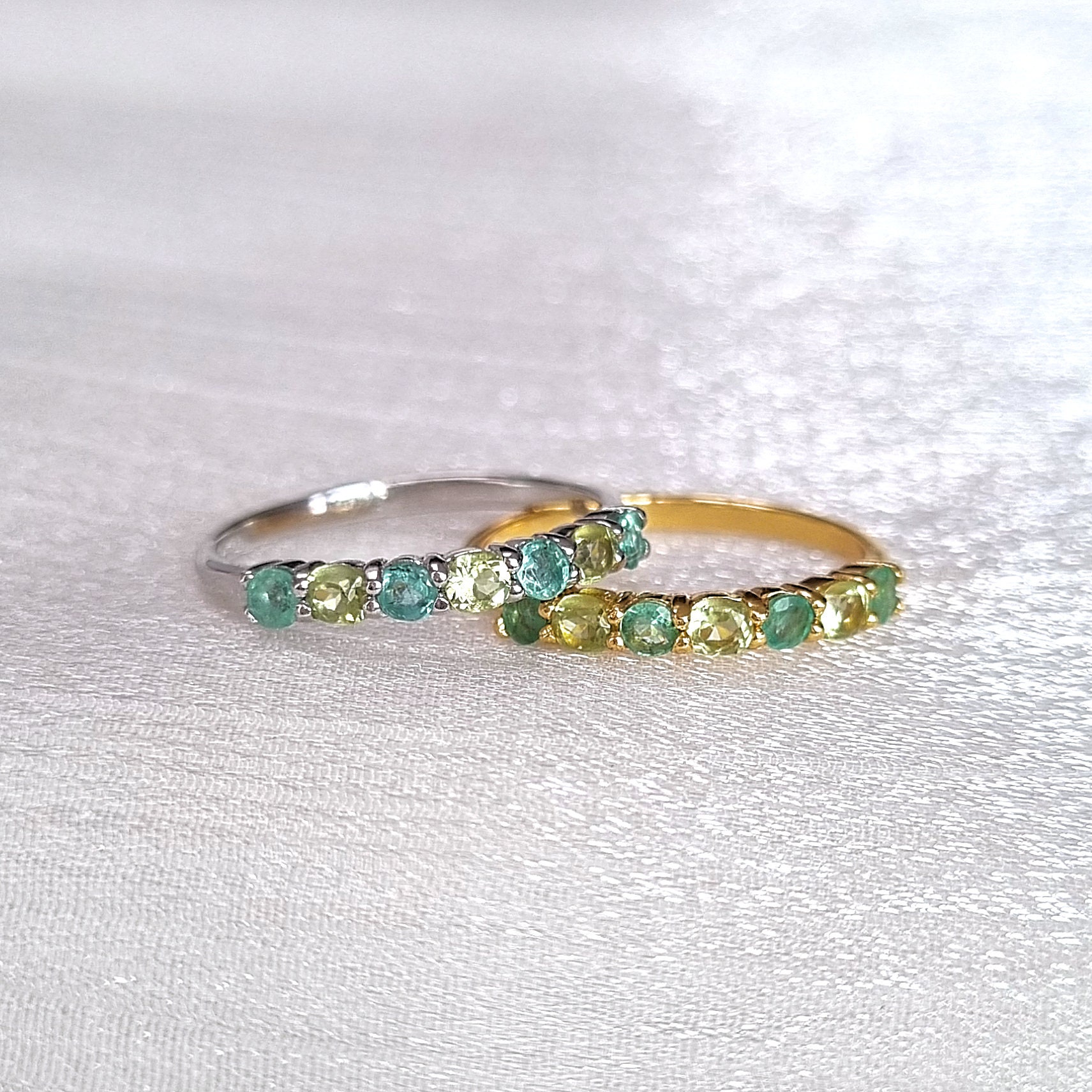 Peridot and emerald eternity ring deals