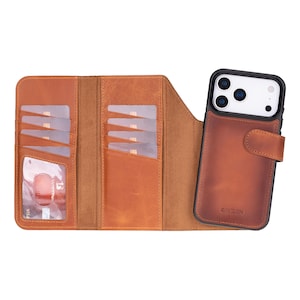 May include: A brown leather wallet-style phone case with multiple card slots and a snap closure. The case is open, revealing the interior card slots and a phone with a black case.