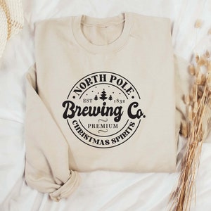 North Pole Brewing Co Sweatshirt, christmas sweater uk, christmas jumper uk, christmas hoodie, retro christmas jumper, classic christmas