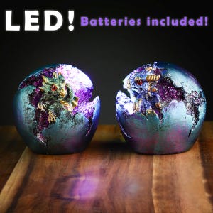 Figura de dragón bebé con luz LED y huevo para incubar de geoda