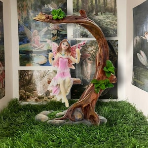 Figura coleccionable de hada de las flores - Columpio