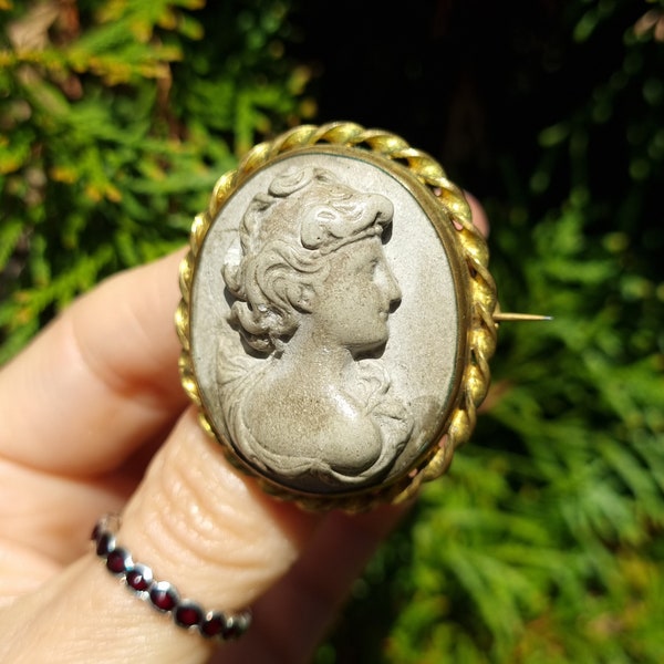 Antique Victorian era lava brooch . Goddess of love , Carved lava Cameo brooch.