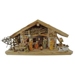 Wonderful handcrafted Neunhof Christmas nativity scene including 12 pieces. Set of figures K 650-9, dimensions: approx. 58 x 20 x 24 cm figures 9.5 cm image 1