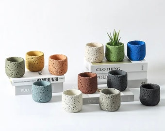 Plant pot, plant pot cover, concrete effect with bubbles, colorful interior decoration.