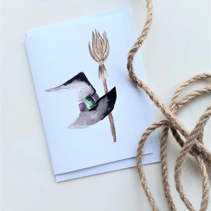 | de cartes de vœux | de cartes sur le thème d’Halloween Chapeau de sorcière et manche à balai