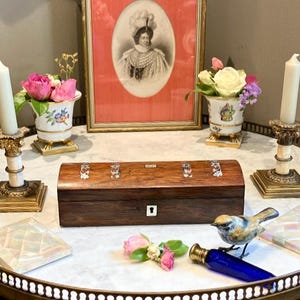 Lady Catherine de Bough the doyenne of exquisite taste never traveled without her Antique Rosewood glove box ,one mustn&#39;t touch commoners