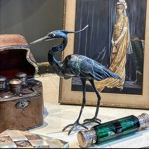 The most enchanting & unusual Solid Bronze Heron Bird Sculpture  with a beautiful verdigris patina hand crafted in the United Kingdom