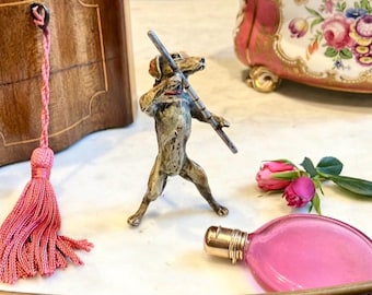 Lydia you sing like an Angel,Mrs Bennet said handing her an Antique Cold Painted Vienna Bronze Dog,More like a howling Hound,Wickham laughed