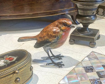 Robins appear when loved ones are near.An enchanting life size Solid Bronze Robin Sculpture with a lovely  patina hand made in the UK