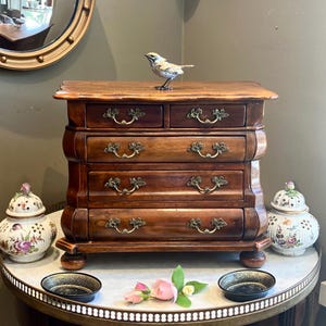 The Countess bought a Miniature Antique Walnut Bombe Chest Of Drawers for her Flat in Saint-Germain & double Bombay gin martini at the Ritz