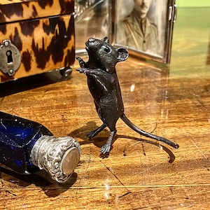 Everyone needs a Cheeky Mouse in their drawing room!A charming little Solid Bronze Mouse Sculpture who won’t keep you up at night,English