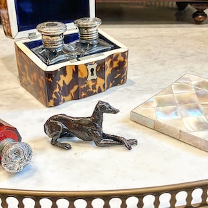 A dog is the only thing on earth that loves you more than himself,A classical Solid Bronze Whippet  Greyhound sculpture richer darker finish