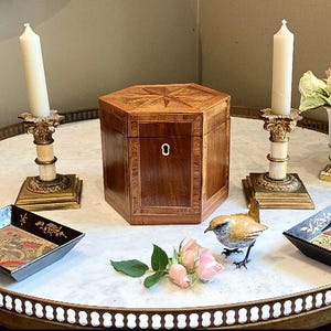 Lady Catherine shall I put the Antique Georgian Hexagonal Inlaid Marquetry Tea Caddy in the carriage?I&#39;m in my Jaguar XJ220Today she replied