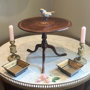 The Countess bought a Miniature Antique Georgian Tilt Top Star Inlay Table as one miniature like a Bellini from Harry’s Bar was never enough