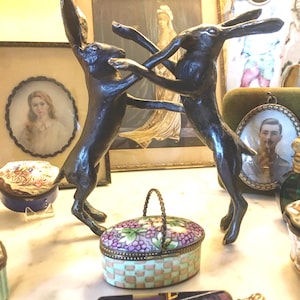 Come box with us !A majestic Solid Bronze Sculpture Of Boxing Hares made in the UK with burnished bronze highlights & a lovely patina