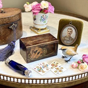Sometimes you have to hugg someone to know how big to make the hole in your garden,Dorian Gray laughed  holding An Antique Italian Card Box