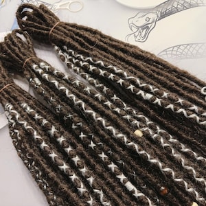 Dark Brown Synthetic Dreads: Silver Thread, Wooden Beads, Snake Wing Pendant