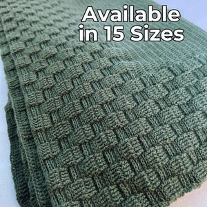 May include: A green knitted blanket with a woven pattern. Available in 15 sizes.