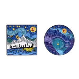 May include: Two enamel pins. One square pin features a starry night sky with a mountain range and silhouetted figures. The other round pin depicts a hobbit hole with a blue door and a starry night sky. Both pins have a silver border.