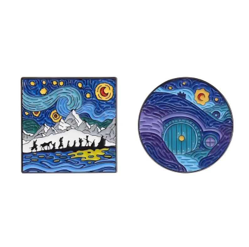 May include: Two enamel pins. One square pin features a starry night sky with a mountain range and silhouetted figures. The other round pin depicts a hobbit hole with a blue door and a starry night sky. Both pins have a silver border.