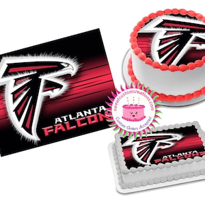 May include: Atlanta Falcons edible cake topper with a red, white, and black design. The topper features the team logo and the words "Atlanta Falcons".