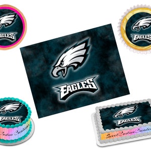 May include: A set of edible cake toppers featuring the Philadelphia Eagles logo. The toppers are printed on edible paper and are available in a variety of sizes. The toppers are perfect for adding a touch of team spirit to your next Eagles party.