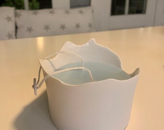 Hand-potted scented porcelain candle