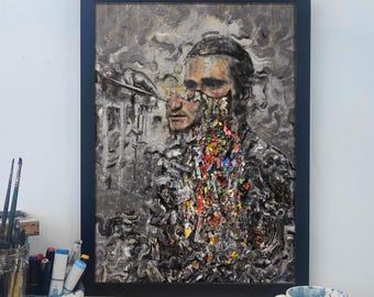 May include: A framed painting of a man's portrait with a textured, abstract background. The man's face is partially obscured by a colorful, textured pattern.