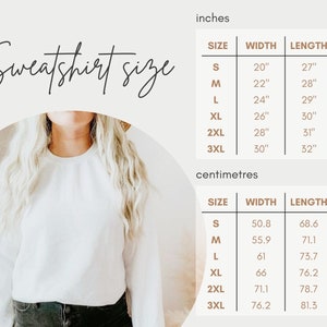 Peut inclure: Un tableau des tailles pour sweat-shirts en pouces et en centim&egrave;tres. Le tableau indique la largeur et la longueur des sweat-shirts dans les tailles S, M, L, XL, 2XL et 3XL.