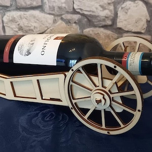 Wine bottle holder cannon shape