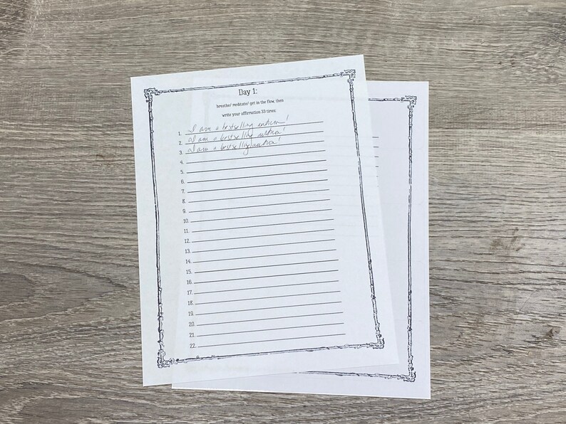 May include: A black and white printable worksheet with the text "Day 1:  I am a bestselling author!" and numbered lines for writing affirmations.