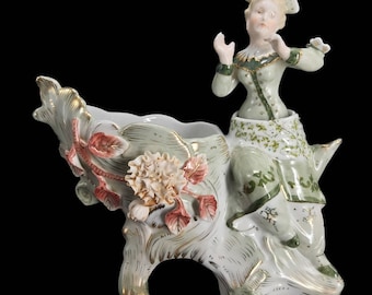 Beautiful porcelain Meissen Like porcelain figure of a young woman, Vide Poche, marked with two swords R.B. - body rocks back and forth