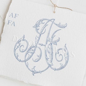 Puede incluir: Un monograma azul y blanco con las letras "AF" entrelazadas en un diseño floral decorativo. Las letras están rodeadas de un patrón de hojas en espiral. El monograma está sobre un fondo blanco con el texto "Descarga instantánea DUOGRAMS" debajo.