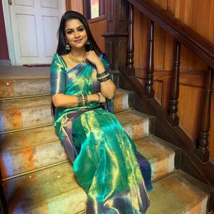 Designer party wear tissue silk saree in sea green with loom Banarasi detailing