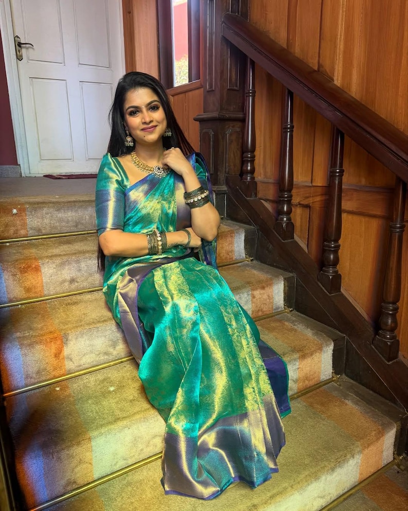 Designer party wear tissue silk saree in sea green with loom Banarasi detailing