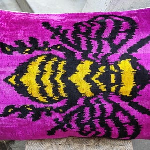 Ikat Velvet Throw Pillow: Black, Pink, & Yellow Bee Design