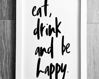 Peut inclure: Une impression encadrée blanche avec du texte noir qui dit "eat, drink and be happy."