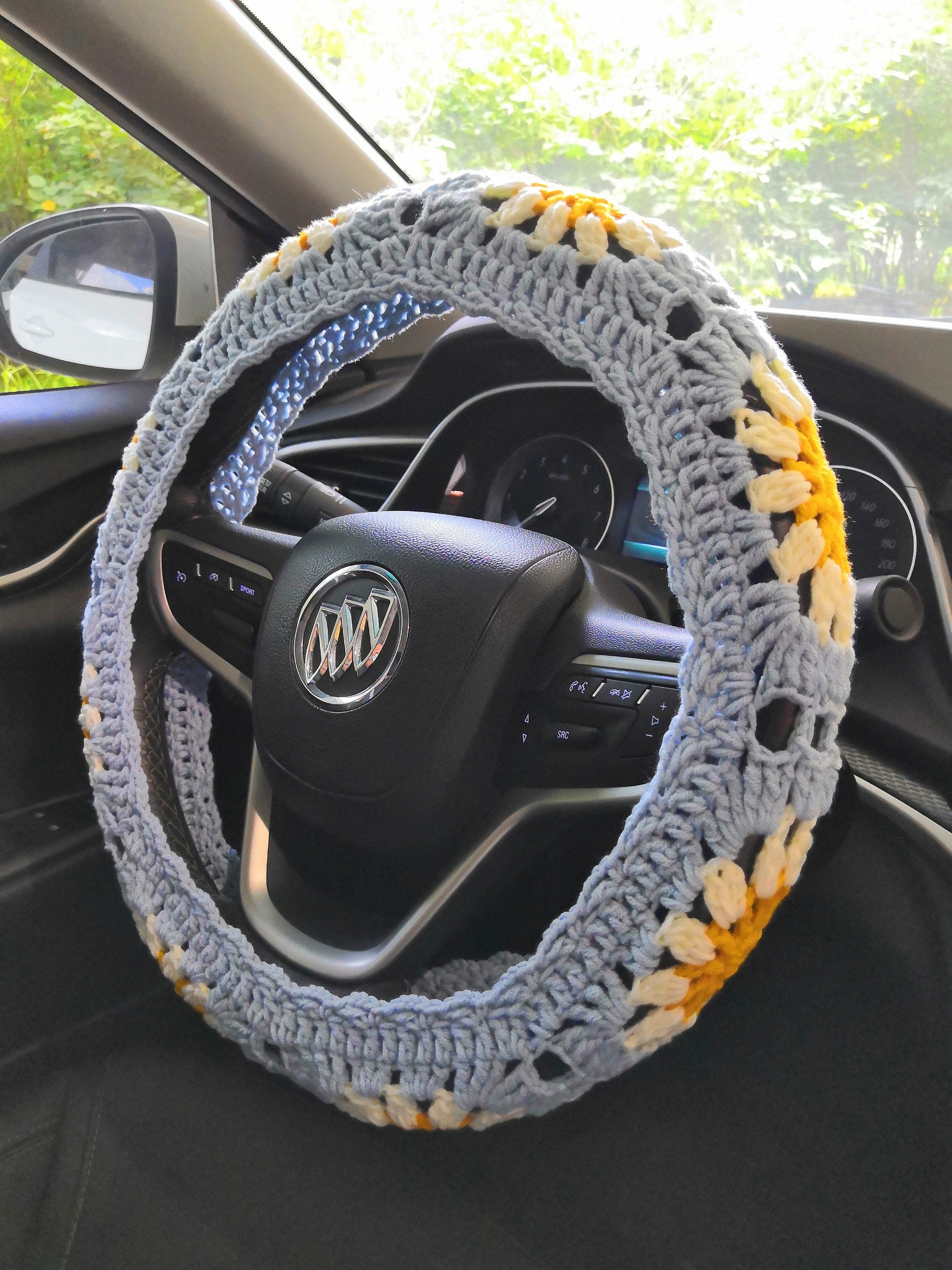 Set coprivolante all'uncinetto con girasole: accessori rosa per auto