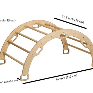 May include: Wooden archway climber with four rungs, measuring 27.5 inches wide, 21.5 inches tall, and 44 inches long. The archway has cut-out shapes and is made of natural wood.