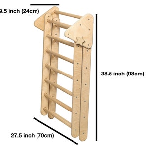 May include: Wooden climbing ladder with 6 rungs, 27.5 inches wide, 38.5 inches tall, and 9.5 inches deep. The ladder is made of natural wood and has a triangular top.