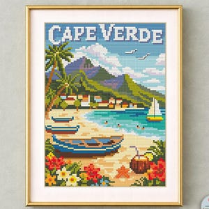 May include: Framed cross-stitch pattern of Cape Verde, featuring a beach scene with boats, palm trees, and a sailboat. The artwork includes the text "CAPE VERDE" at the top and "CROSS STITCH PATTERN" at the bottom. The image is in a gold frame.