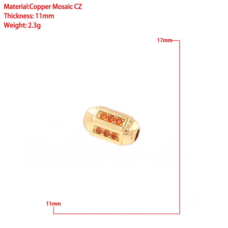 May include: A gold-colored bead with a rectangular design and orange cubic zirconia stones. The bead measures 17 mm in length and 11 mm in width. Material: Copper Mosaic CZ. Thickness: 11 mm. Weight: 2.3 g.