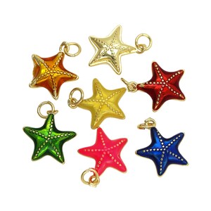 May include: Eight enamel starfish charms in various colors, including red, orange, yellow, green, blue, and pink. Each charm has a gold-tone loop for attaching to jewelry or other crafts.